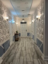 Front entrance
This is also where 2 bedrooms & bathrooms are accessible. One has a deep bathtub and the other has a shower.