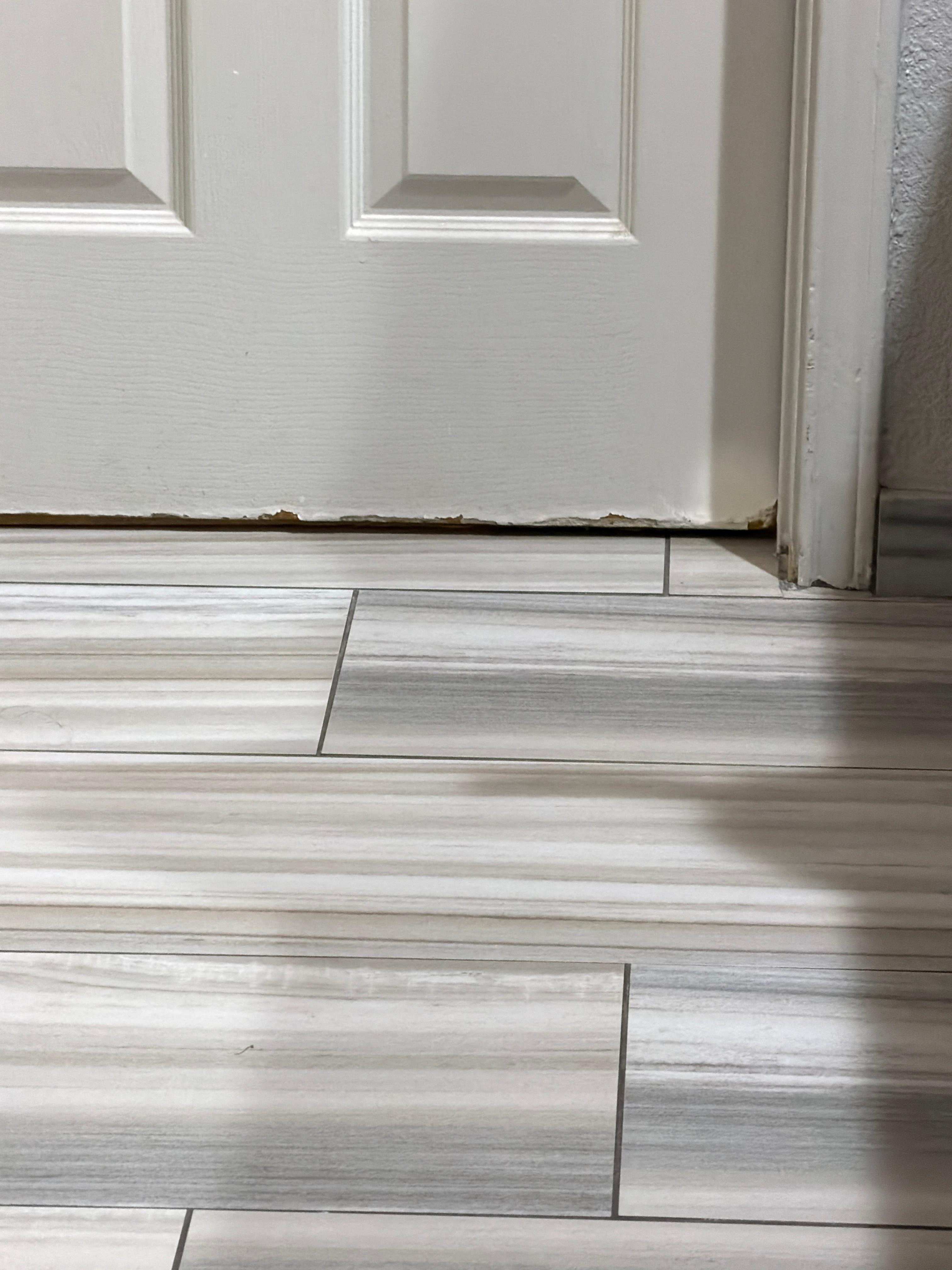 The door does not seal against the door frame and the bottom is chewed?  I am not really sure what happened here but this does not look like any I have seen online.