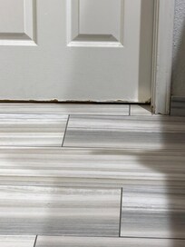 The door does not seal against the door frame and the bottom is chewed? I am not really sure what happened here but this does not look like any I have seen online.