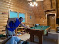 Anyone for a game of pool? Then can relax in the hot tub.