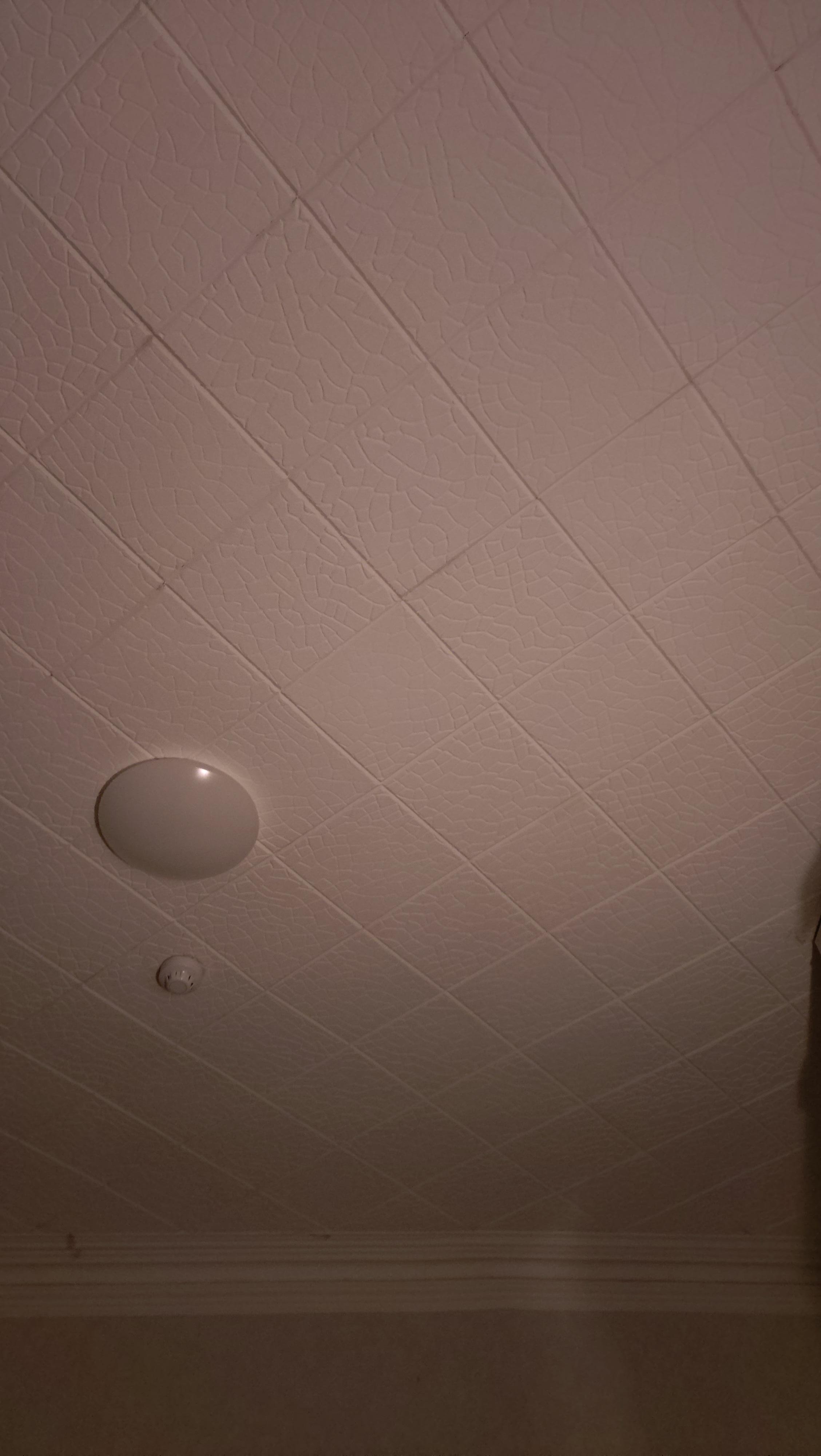 Polystyrene tiles on ceiling which I thought was illegal but they are a fire hazard 