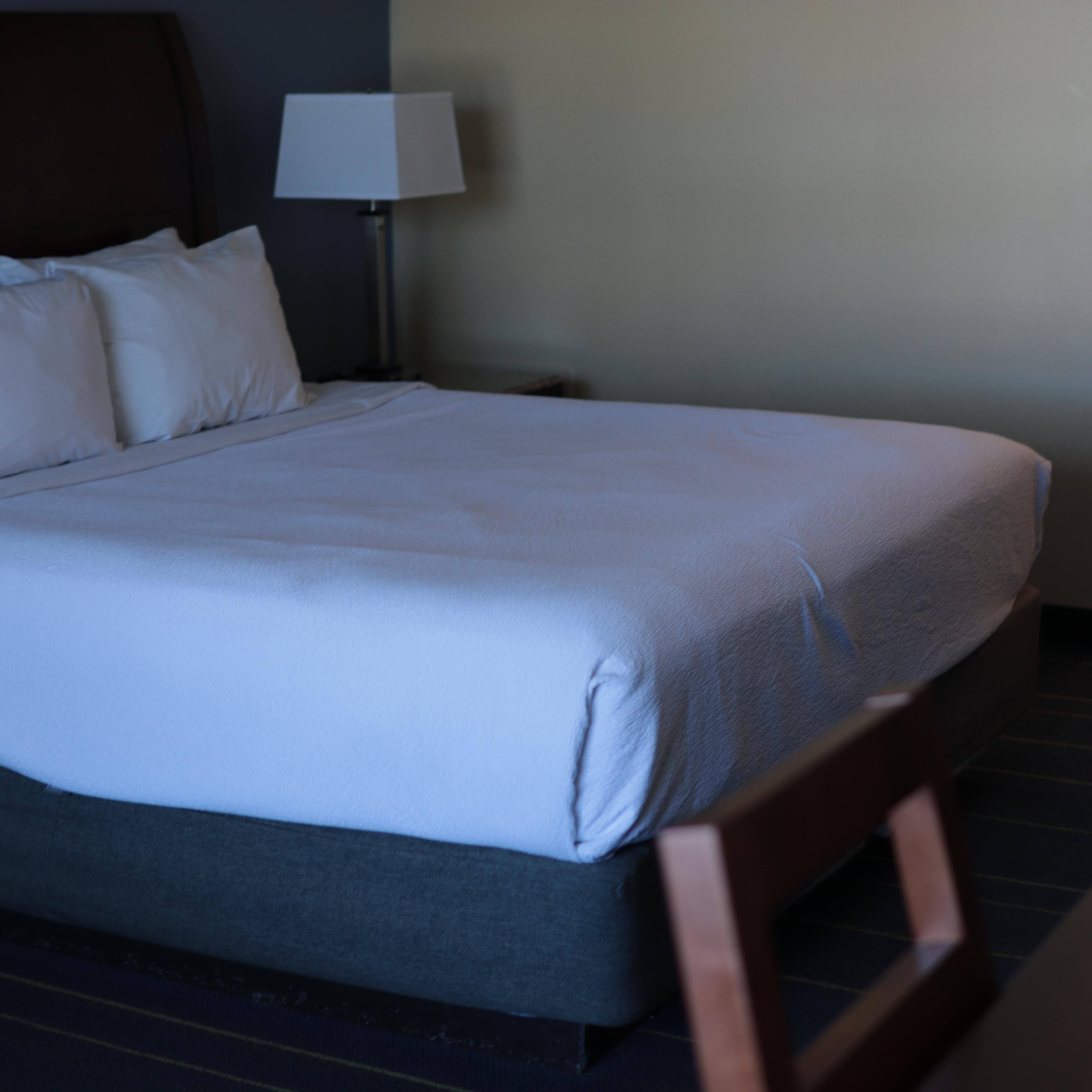 A nice bed with clean linen.