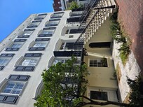 Side view, stayed on second floor.
