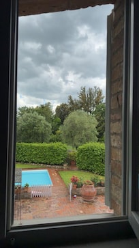 Over the pool and the garden