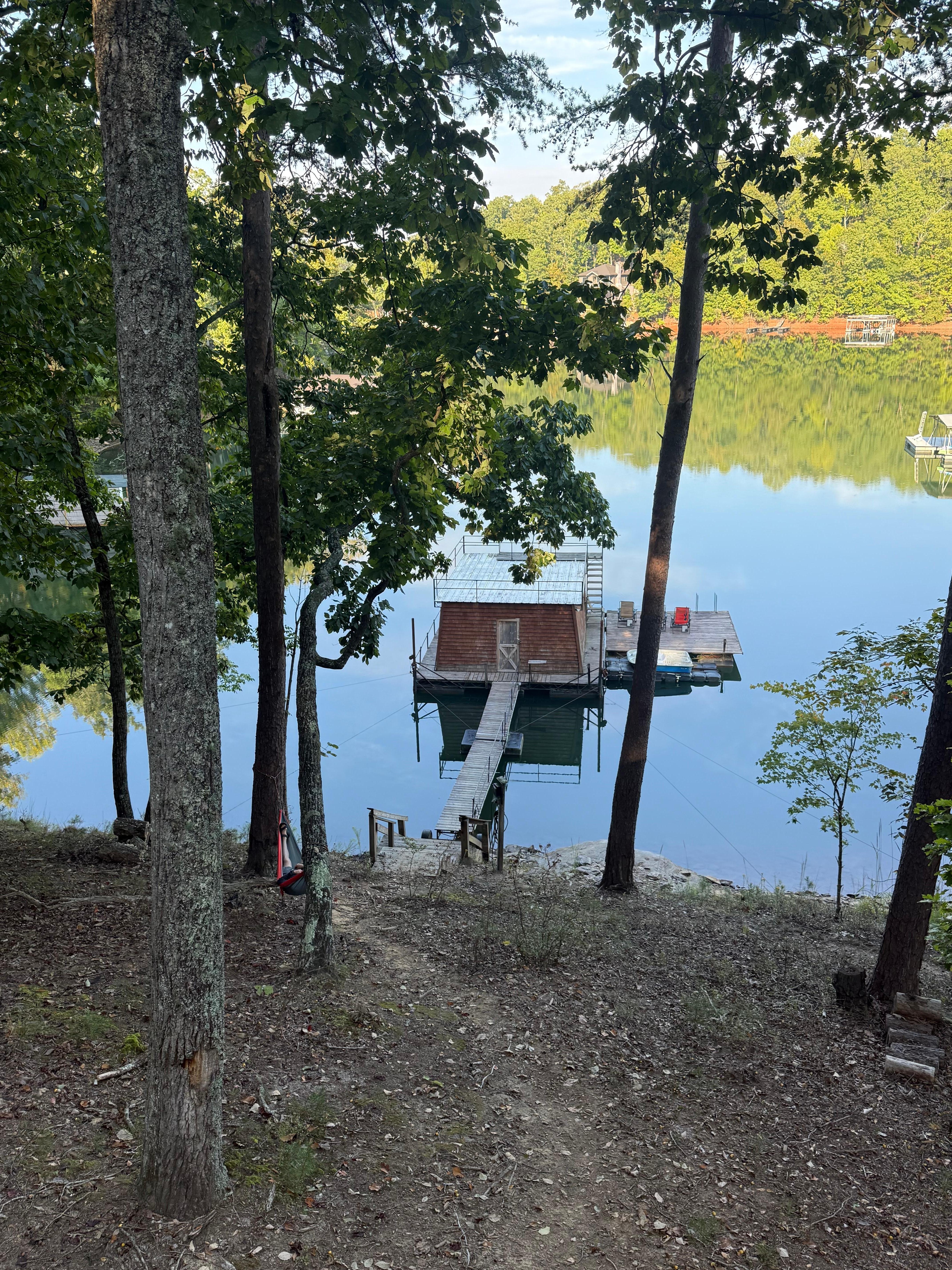 Perfect lakeside home on a secluded cove on Lake Lanier. 