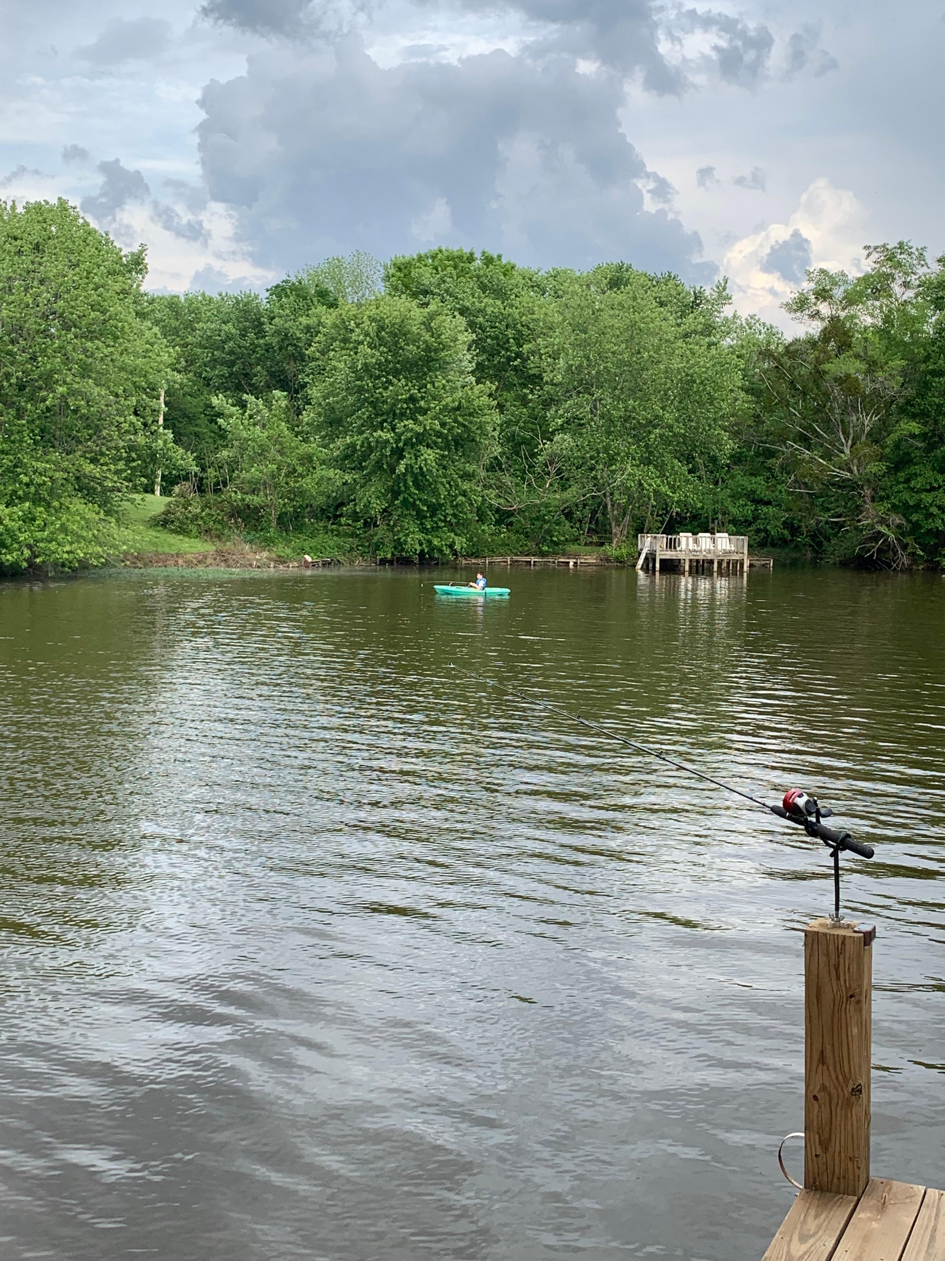 Kid fishing in the kayak
