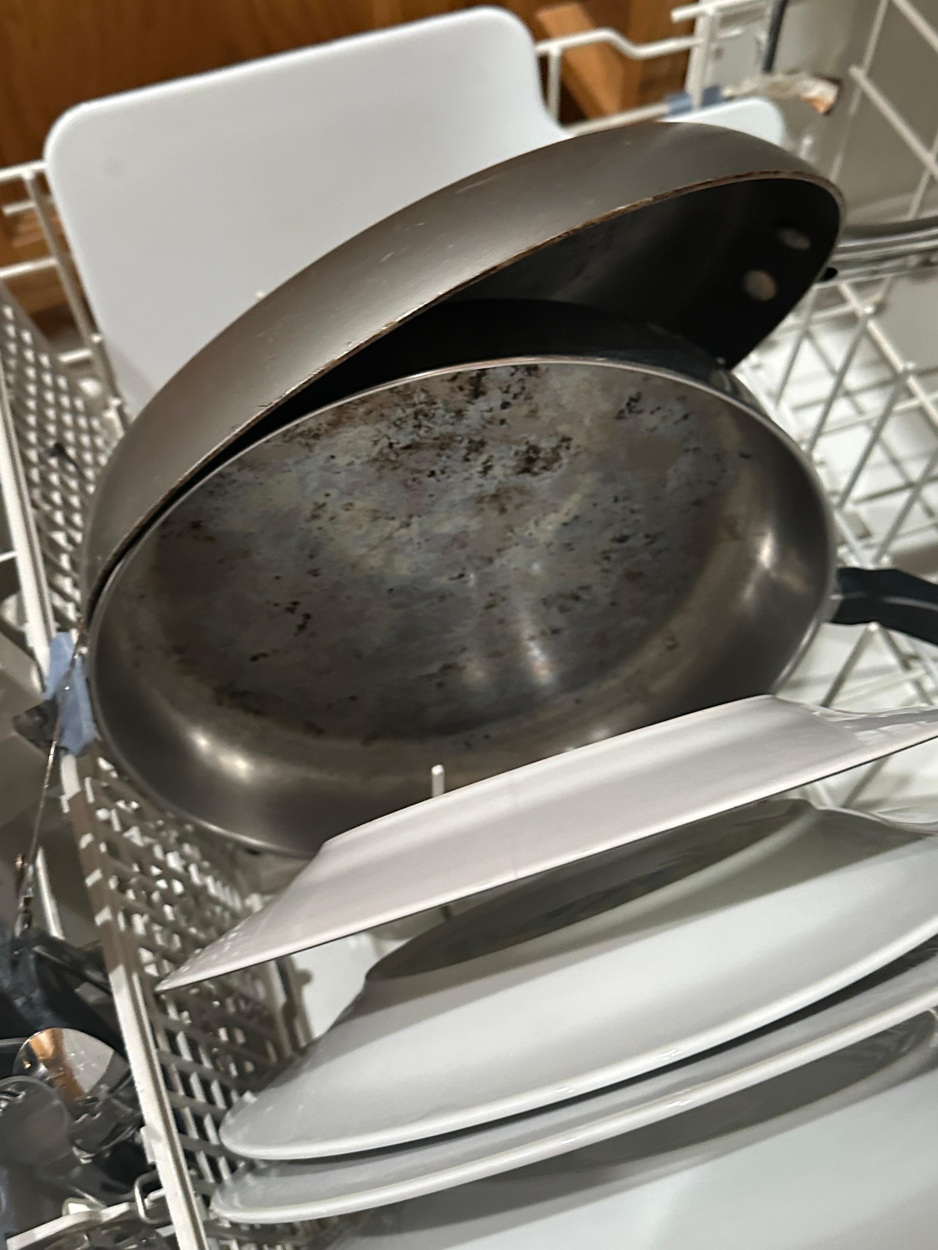 Dirty pots and dishes found in kitchen.  