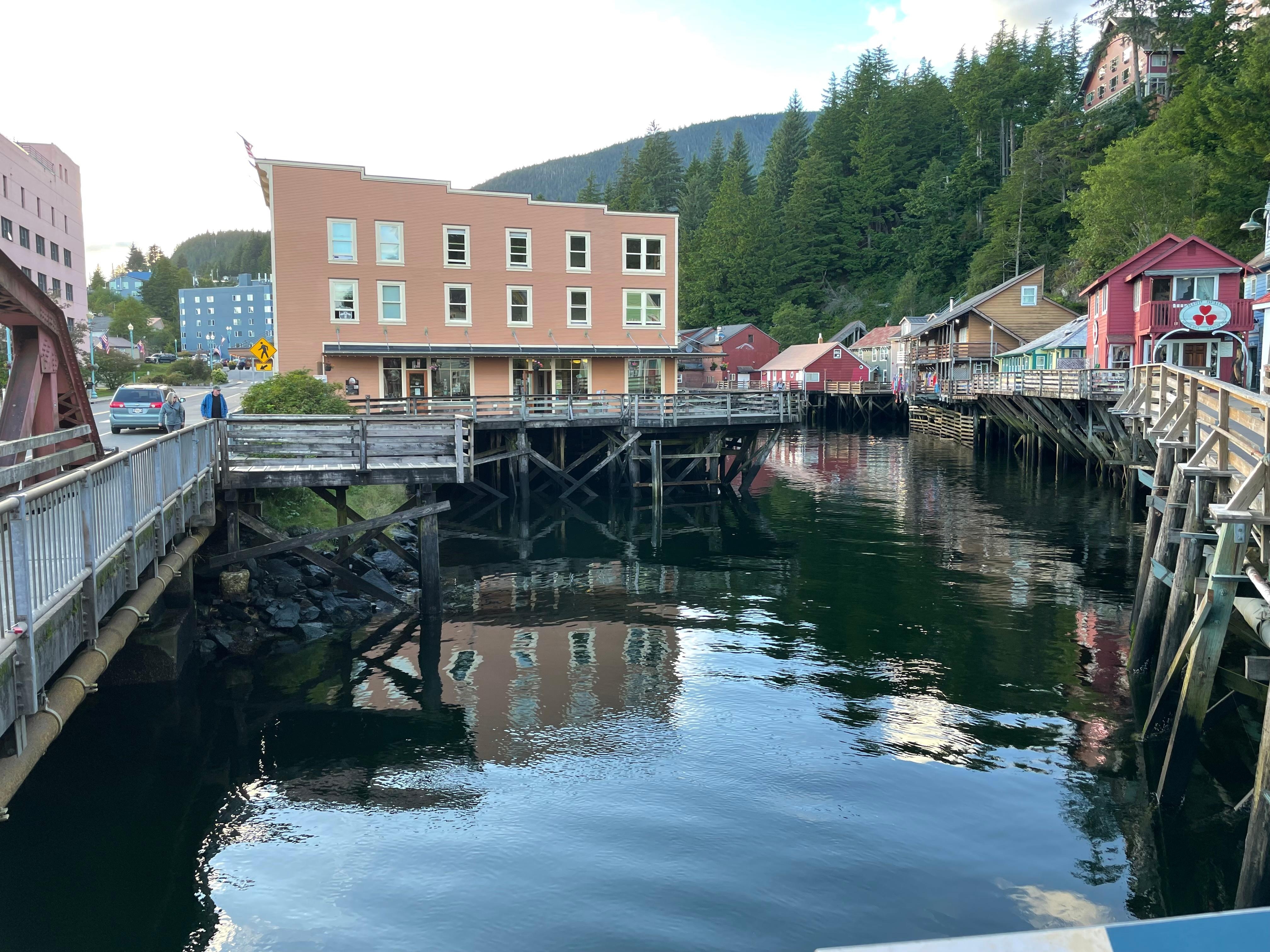 Hotel is salmon-colored building on the left.