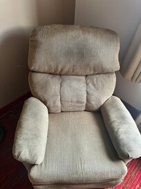 Hear rest and arms of chair are completely filthy