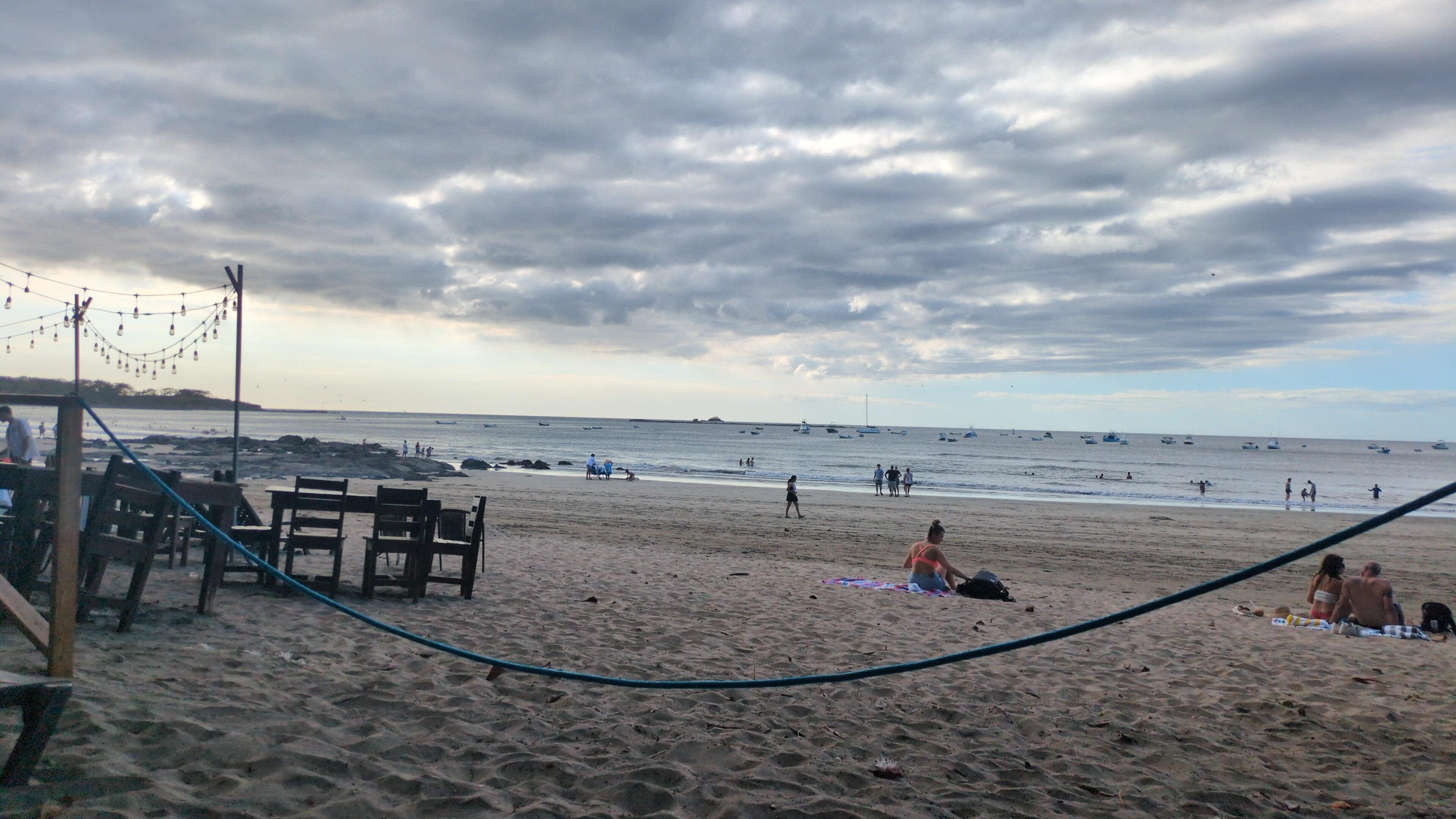Beach out front of the hotel - restaurant seating to the left