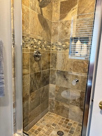 Master bath shower. Nice bonus having shower items included.