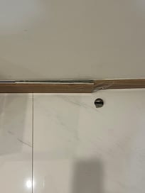 Baseboard held together with tape