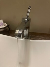 Bathroom sink main floor….faucet open fully. 2cd floor bathroom marginally better.