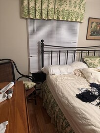 The blind did not cover the window preventing full darkness and privacy.
