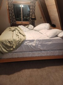 The bed was not made. Dirty linen from previous visitors