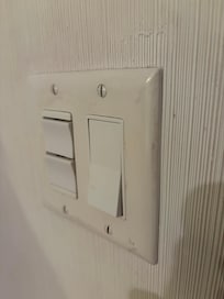 All light switches and walls full of dirt, finger printts