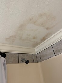 Stained ceiling in the bathroom