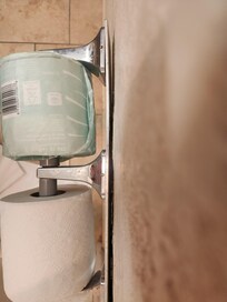 Toilet paper holder falling off wall