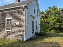 Historic marker on front of house