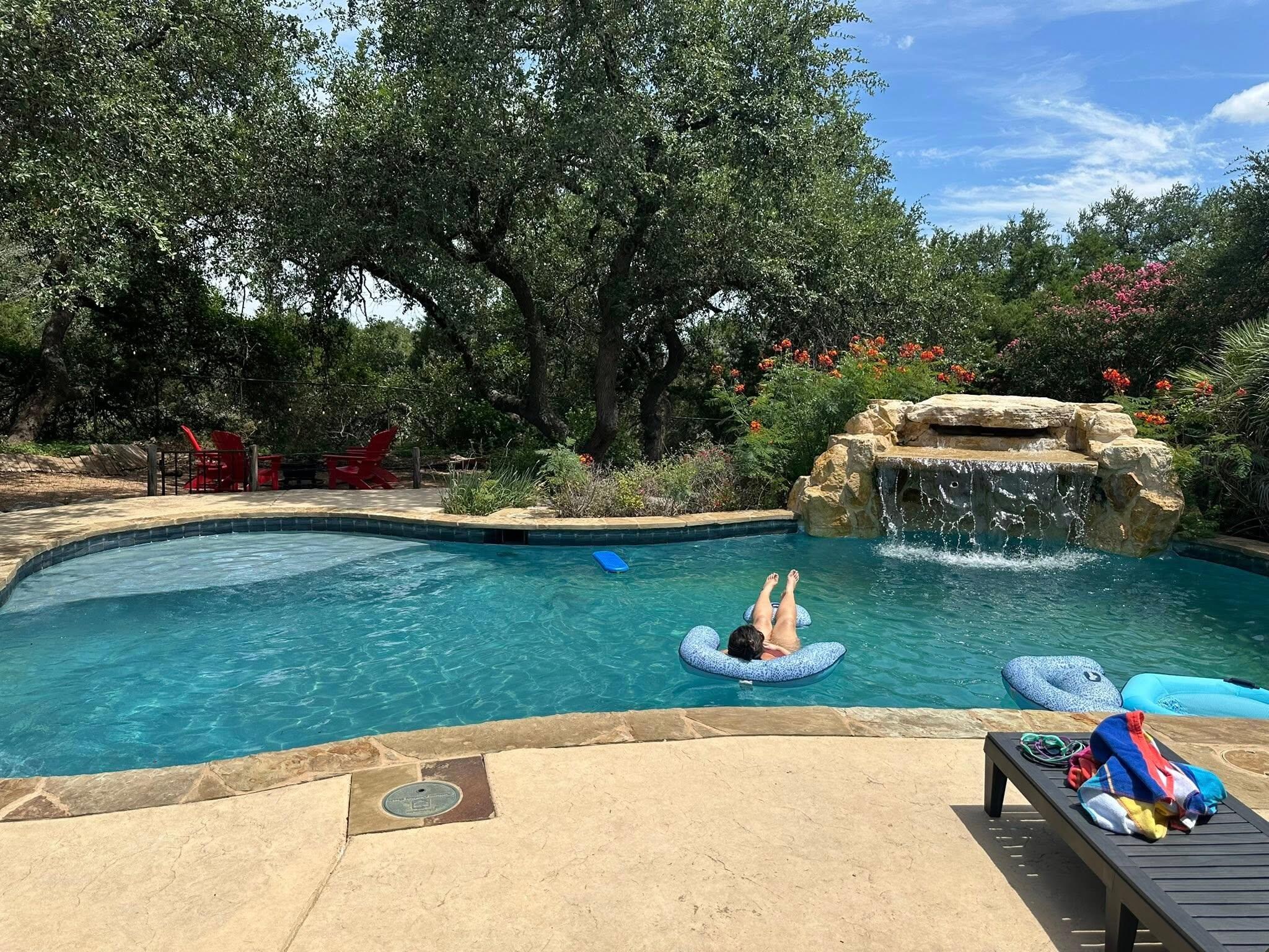 The pool was large with a mermaid cove and bench under the waterfall. There is a nice sunning ledge and a bench in the deeper end of the pool to relax on. Plenty of pool decking for chairs and sunbathing. Such a great space!