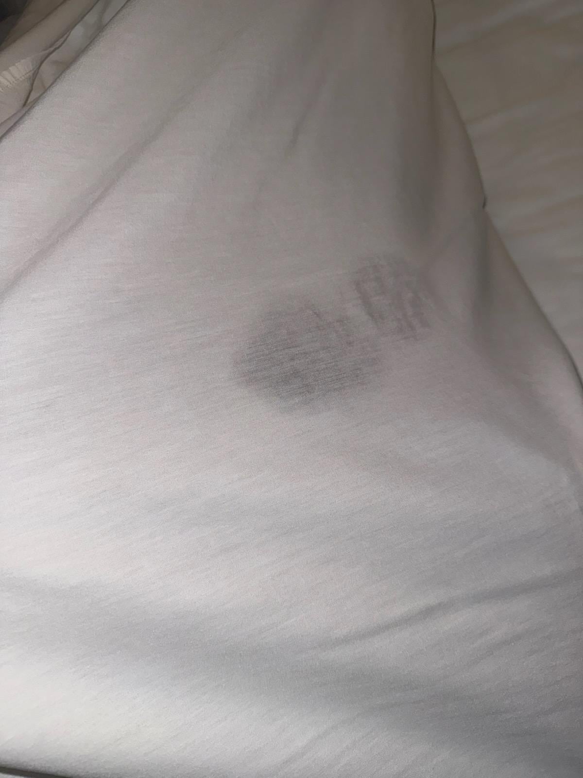 One of multiple stains on sheets