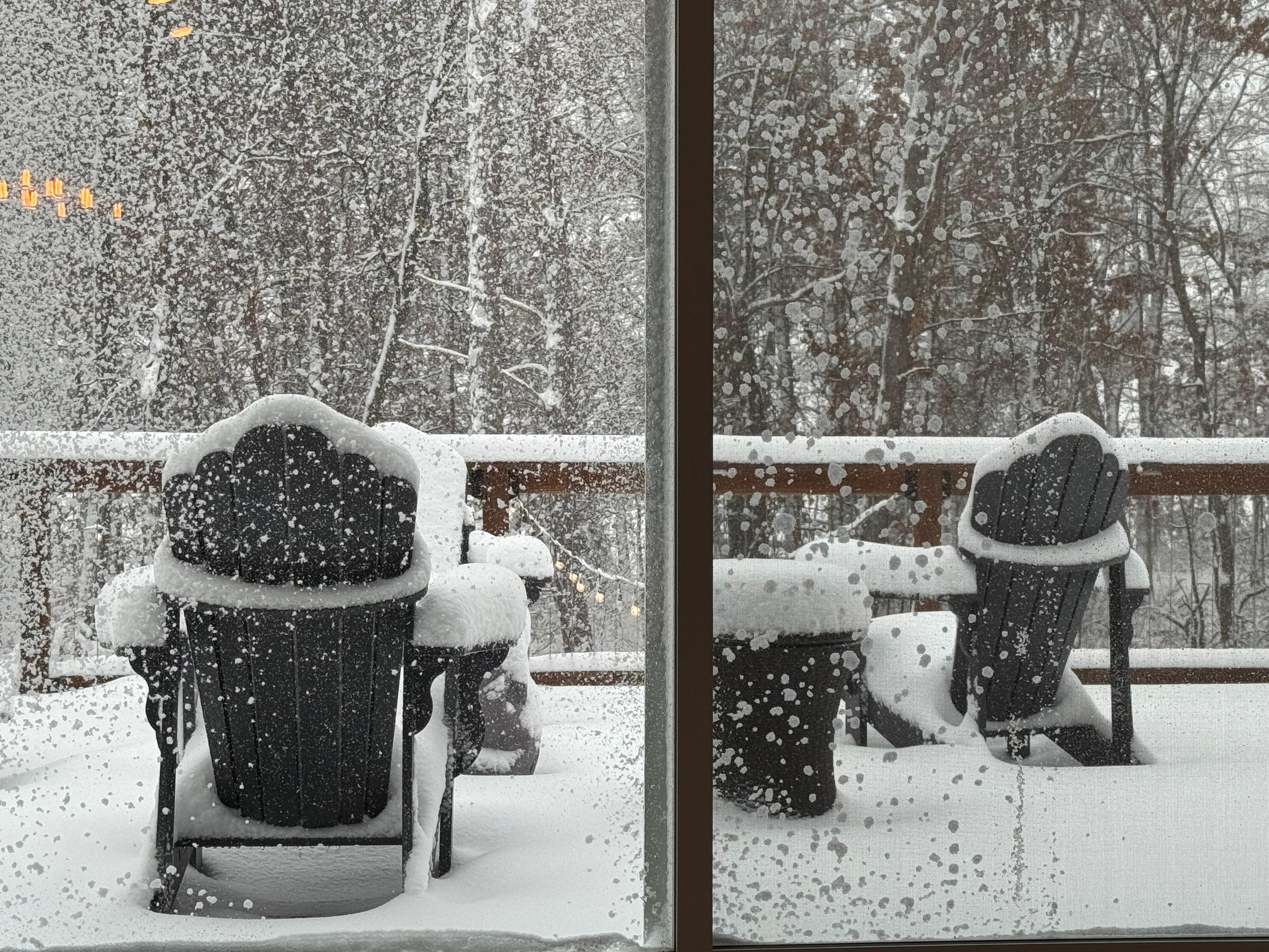Beautiful views toward the lake with the fire pit and abundance of seating in the foreground. 
