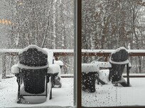 Beautiful views toward the lake with the fire pit and abundance of seating in the foreground.