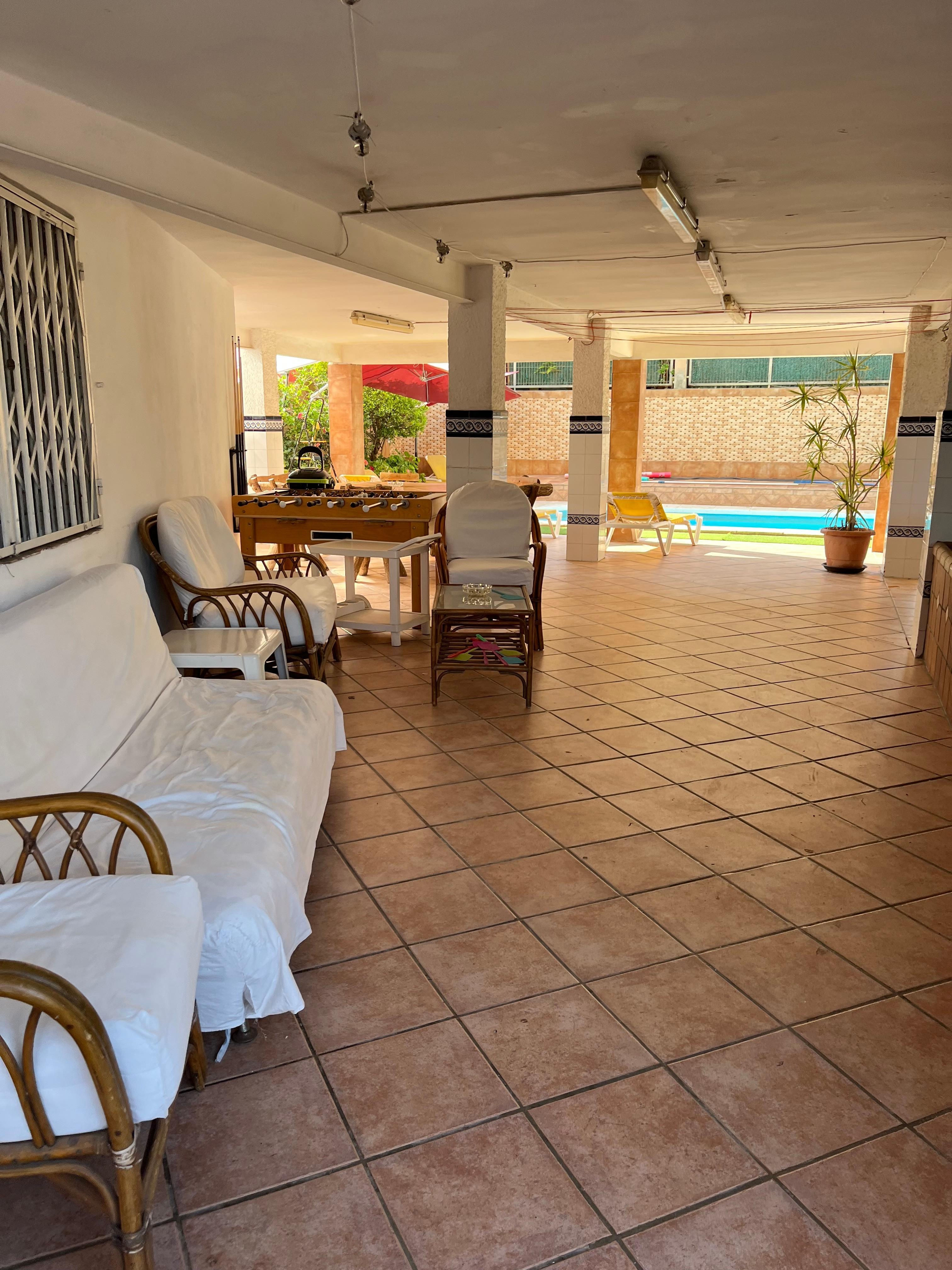 Half of the outdoor space, other half has BBQ darts trampoline seating