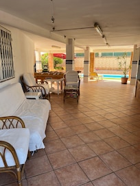 Half of the outdoor space, other half has BBQ darts trampoline seating