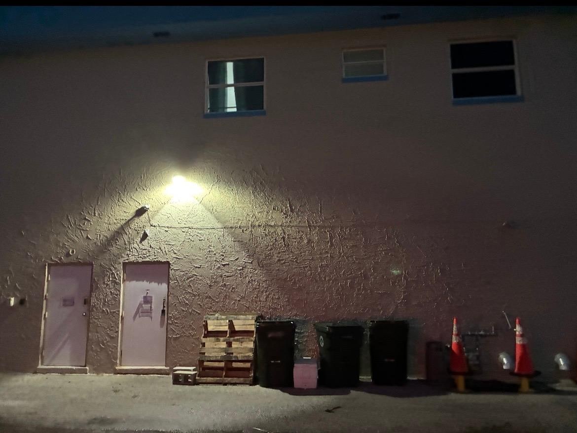 The door on the left is the entrance to the unit. 