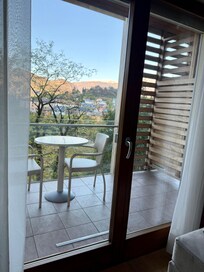 One of the bedroom’s balconies