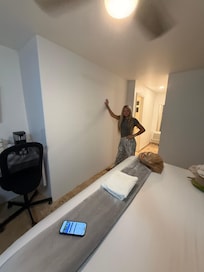 My daughter standing where the kitchen in the picture should be.