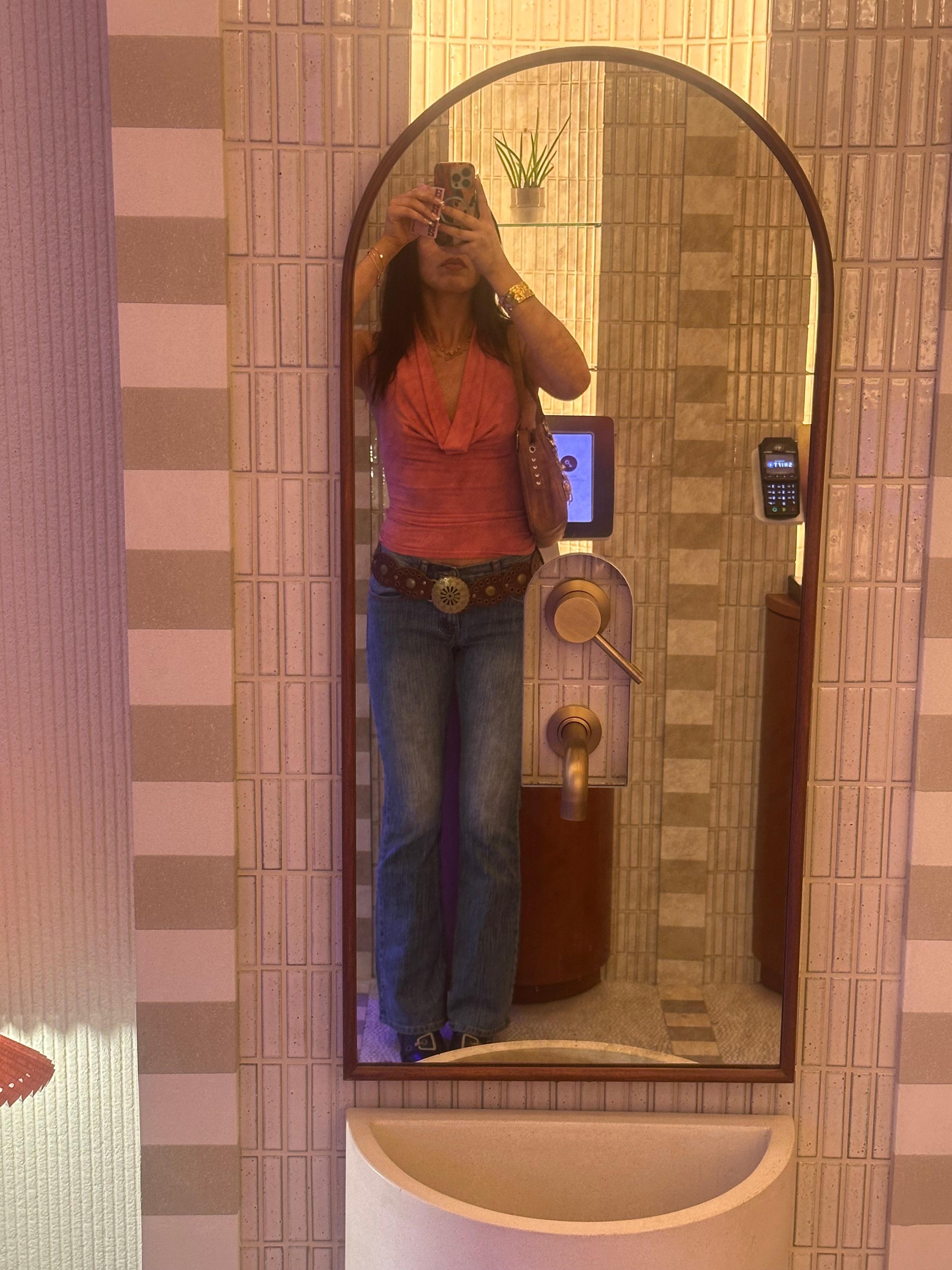 Lobby area mirror by front desk at night