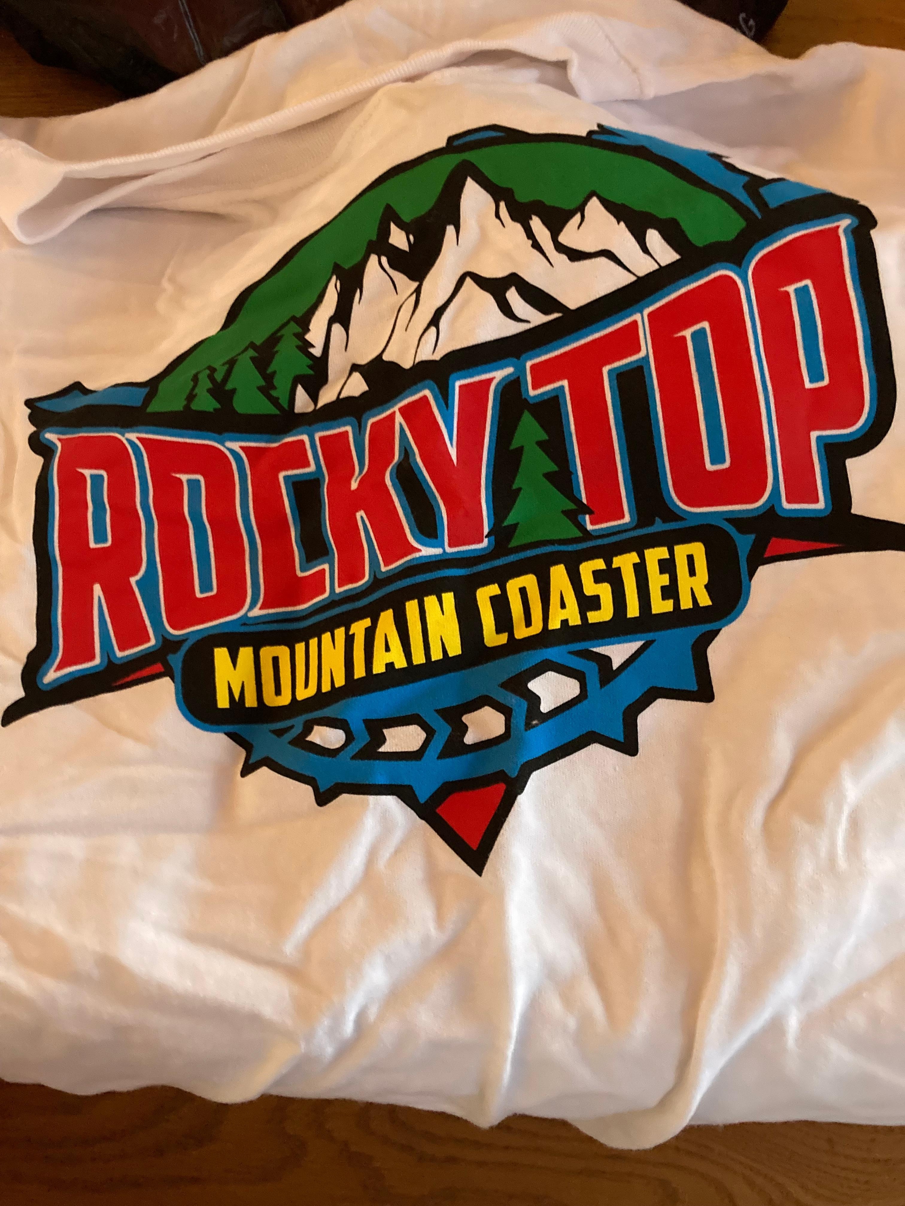 Mountain coaster.  9 mins of fun. 