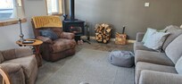 The living room was a cozy place to curl up after being in the hot tub!