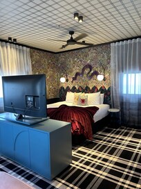 Comfortable large bed with swivel tv