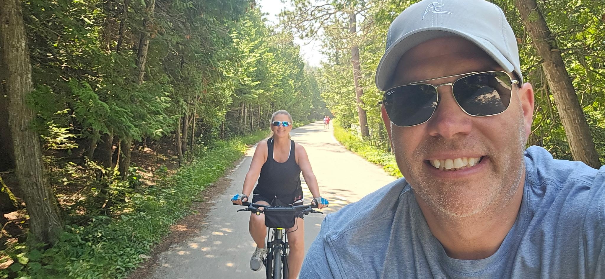 Riding our bikes around Mackinac Island!  We brought our own bikes but you can rent them as well.  What a great way to experience the island!!