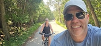 Riding our bikes around Mackinac Island! We brought our own bikes but you can rent them as well. What a great way to experience the island!!