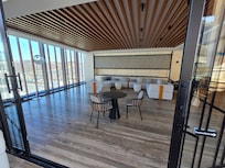 Restaurant by pool and lounge area