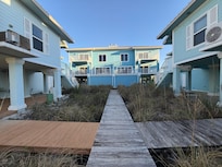 Looking back at the house from the walk to the beach