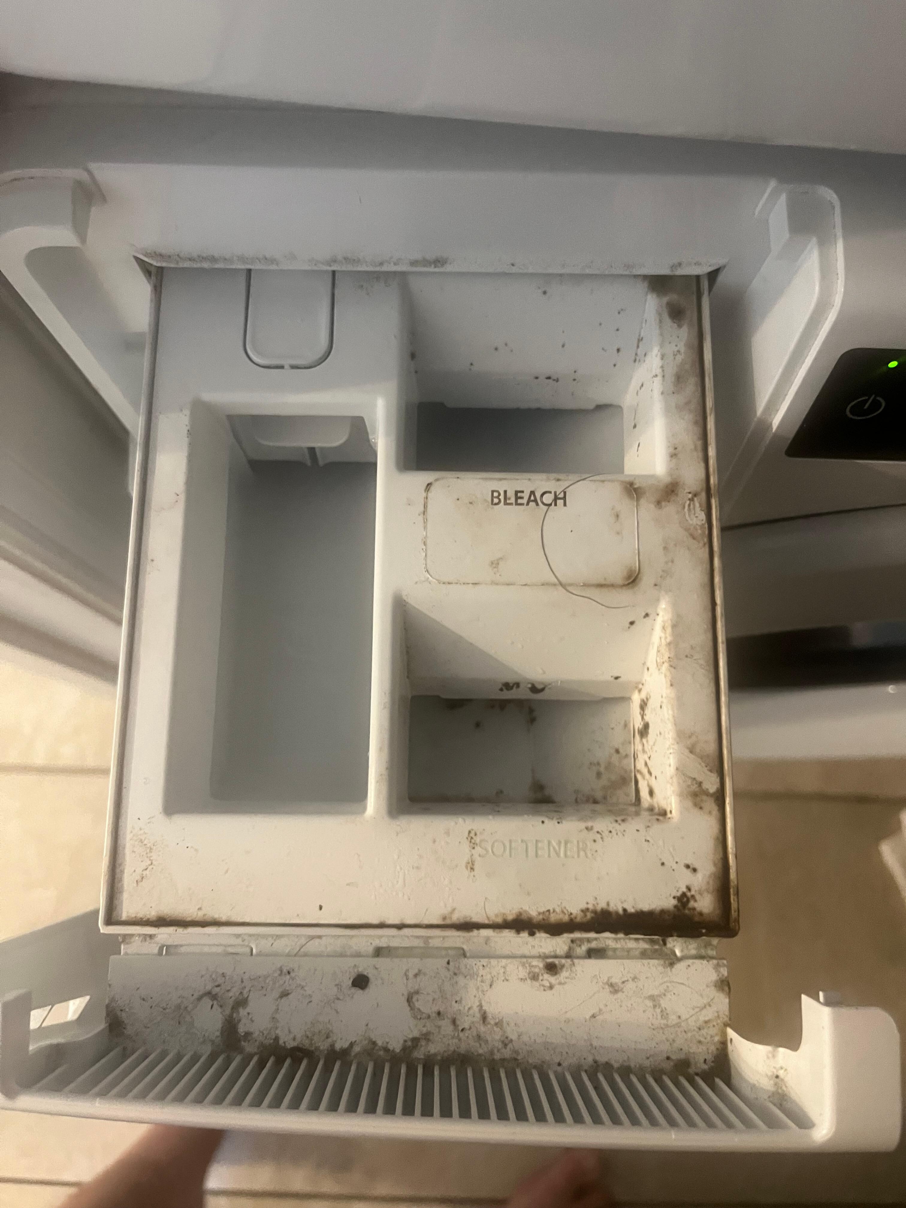 Dispenser of washing machine where detergent goes. 