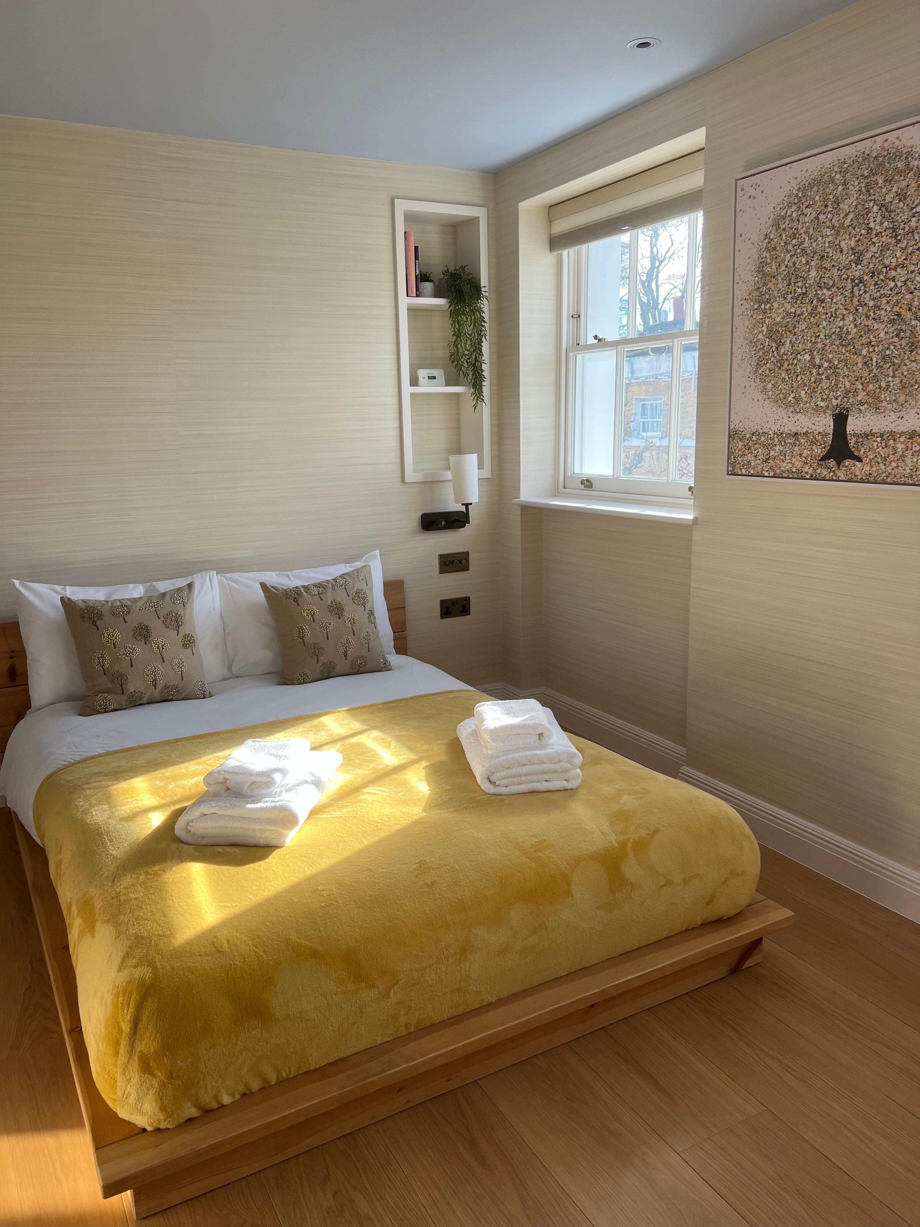 One of 2 top floor bedrooms, with full and half bath on the same floor. 