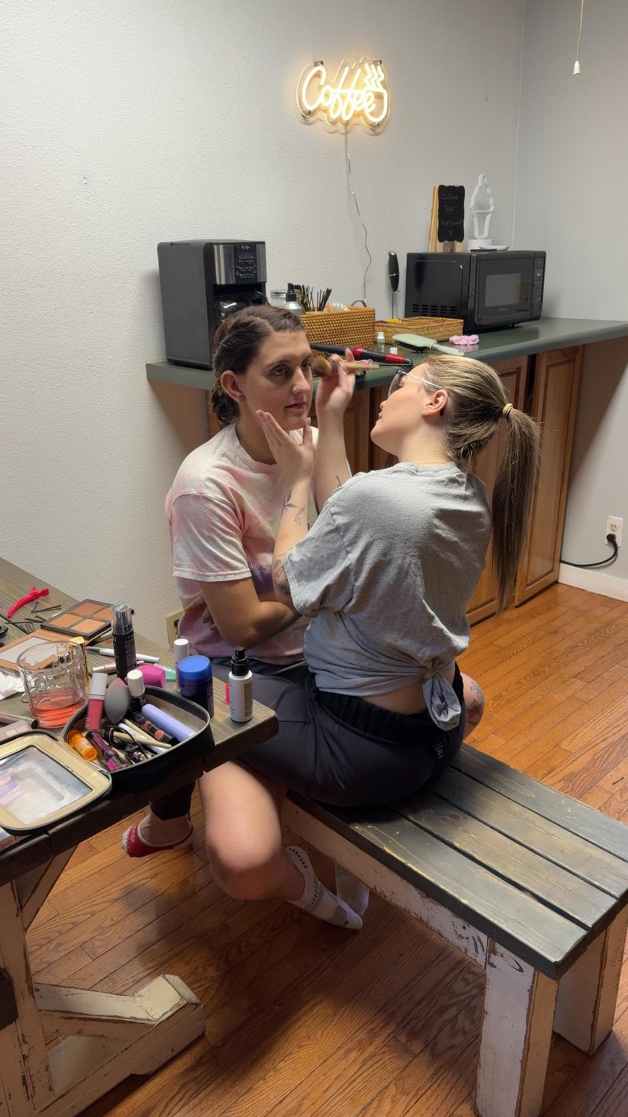 Personal attendant getting the bride ready for her big day. 