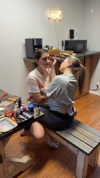 Personal attendant getting the bride ready for her big day.