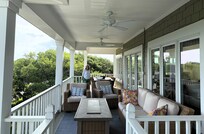A portion of the gorgeous porch on the third floor, perfect for relaxing or meals.