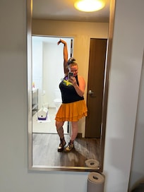 The only pic I took in the room. This is the shirt I converted with the loaned scissor, but you can see the bathroom is spacious and clean.