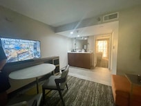 Living space with sink, fridge and microwave