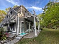 Main entrance for guests right next to the guest parking space.