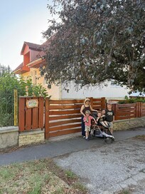 At the gate leading to the guest house