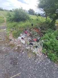 The ‘pathway to the beach’ is really a local trash dump